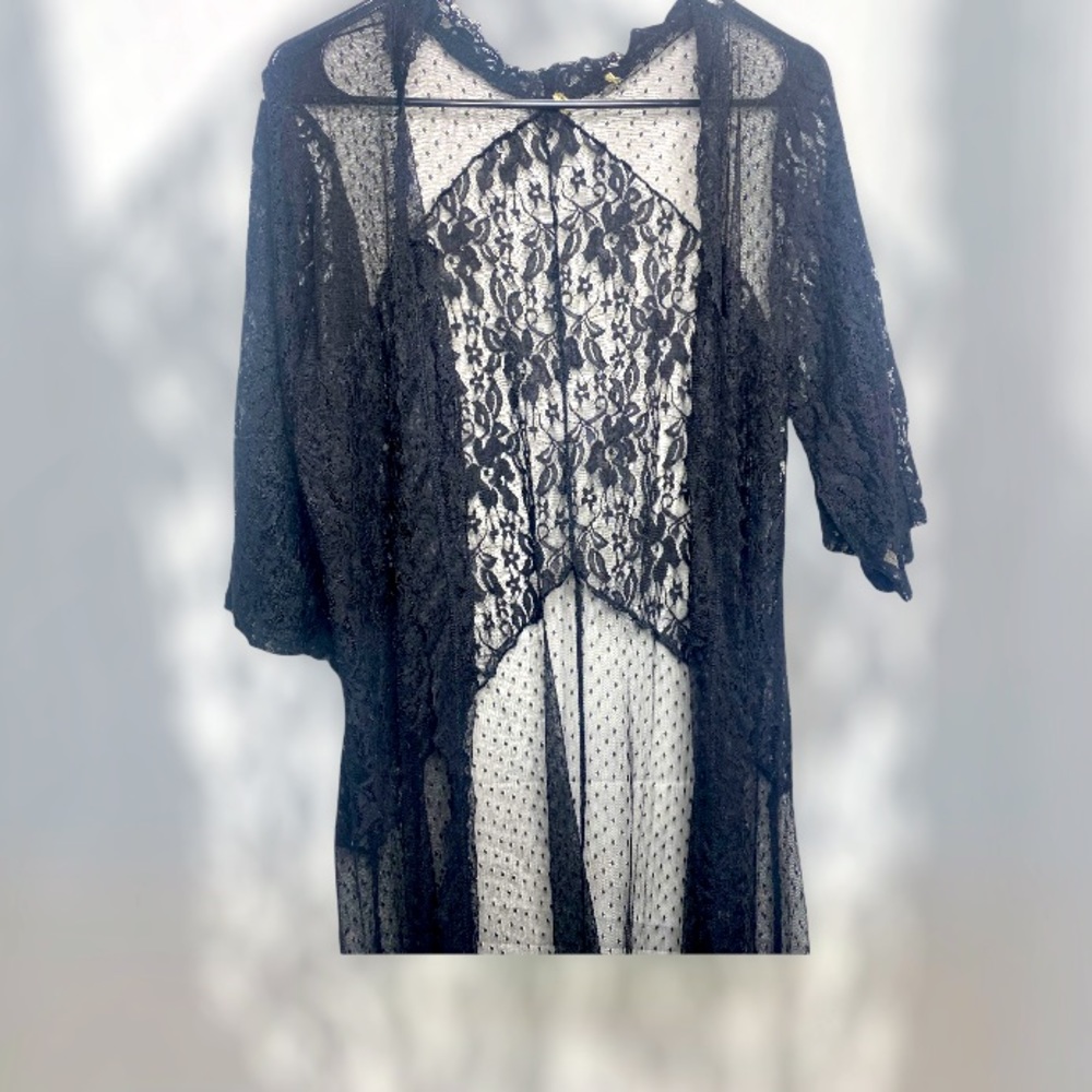 Can be used as a cover up of many kind. Black black lace material